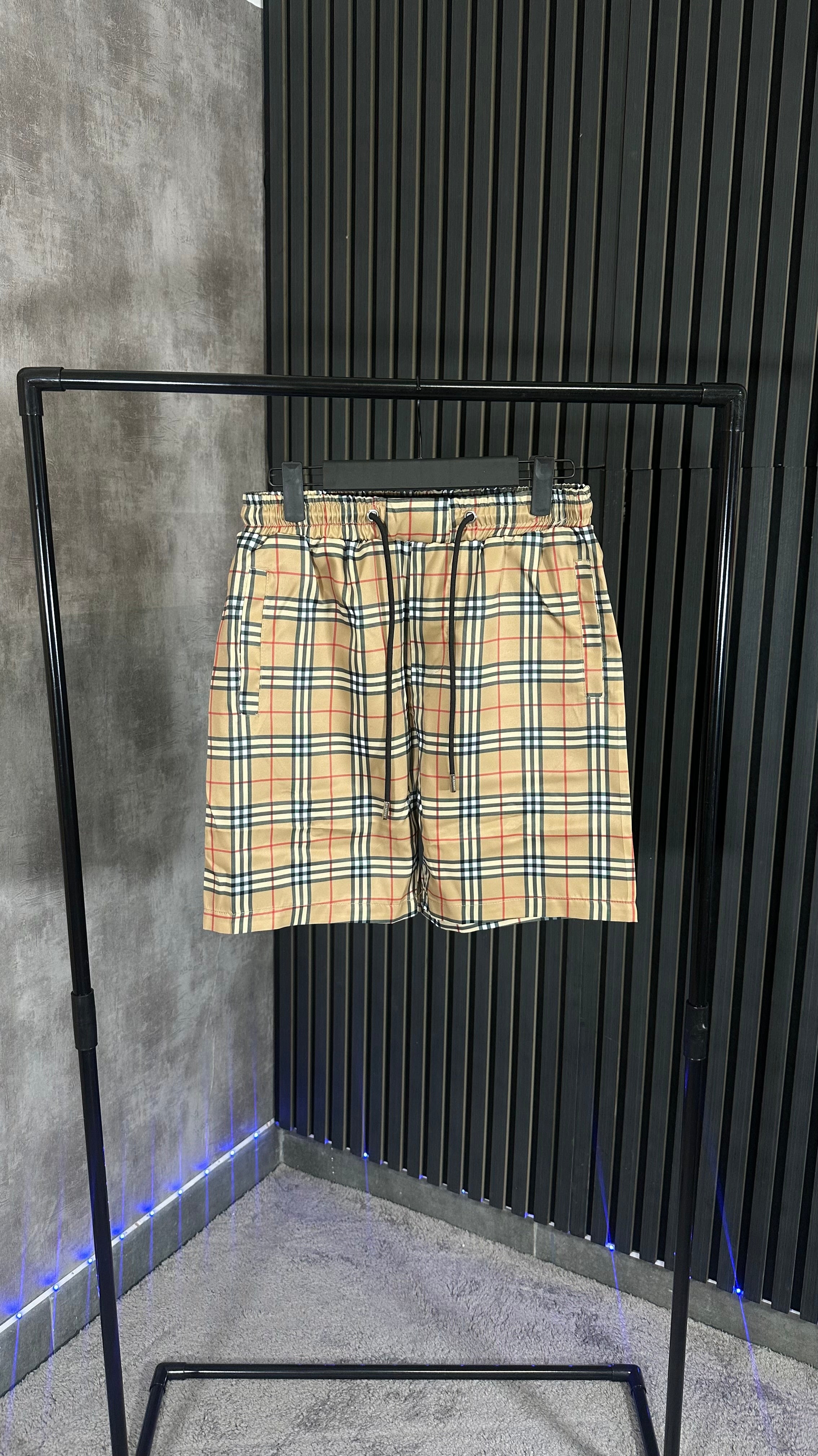PANTALONES CORTOS BURBERR¥