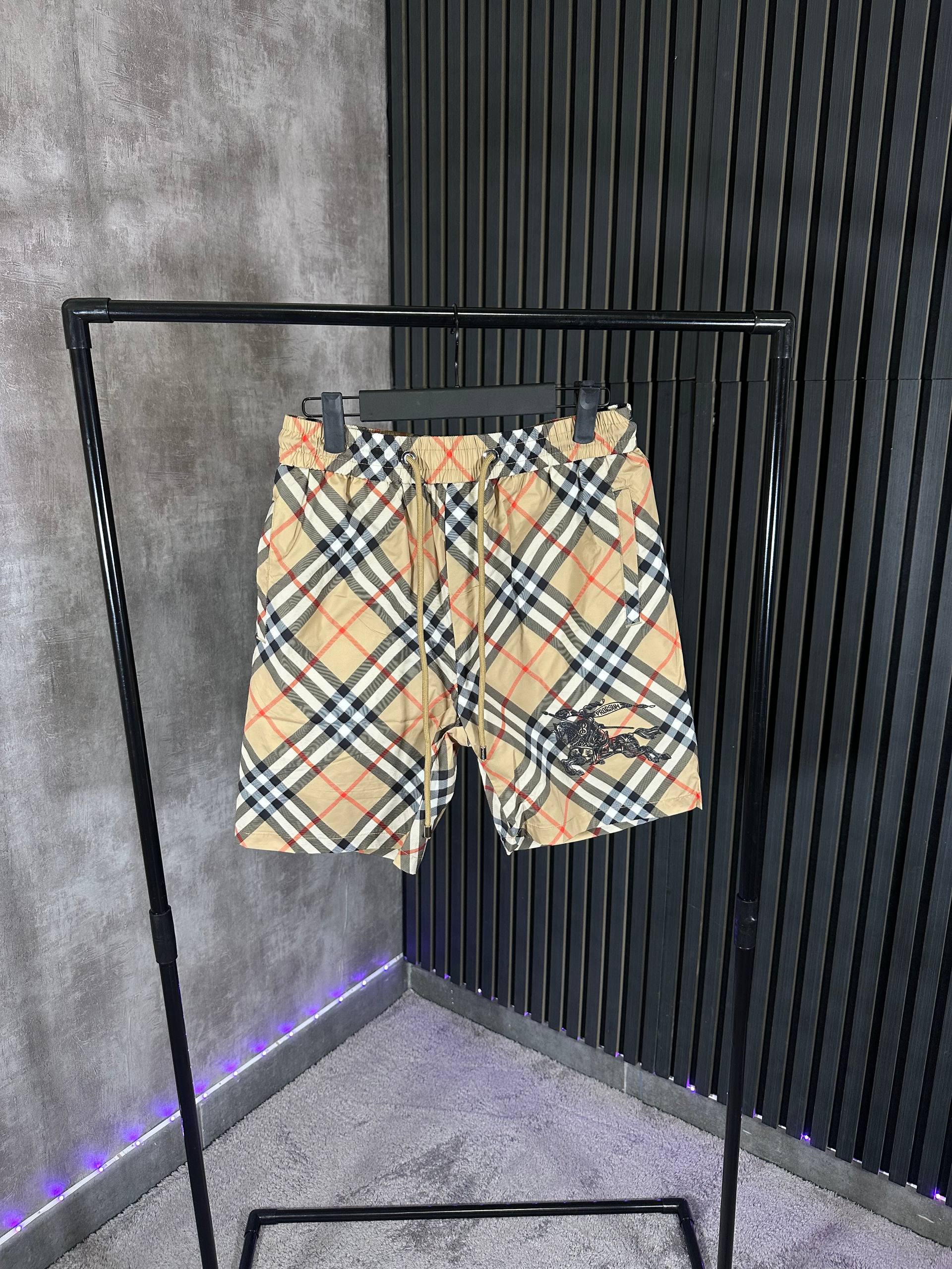 PANTALONES CORTOS BURBERR¥